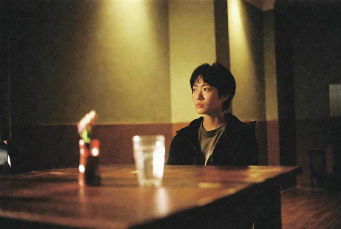 Empty theater auditorium with warm low lighting before a screening
